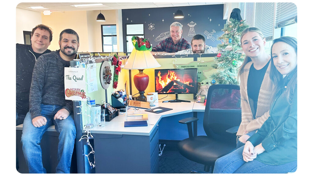 CTM team around their holiday themed work stations. 