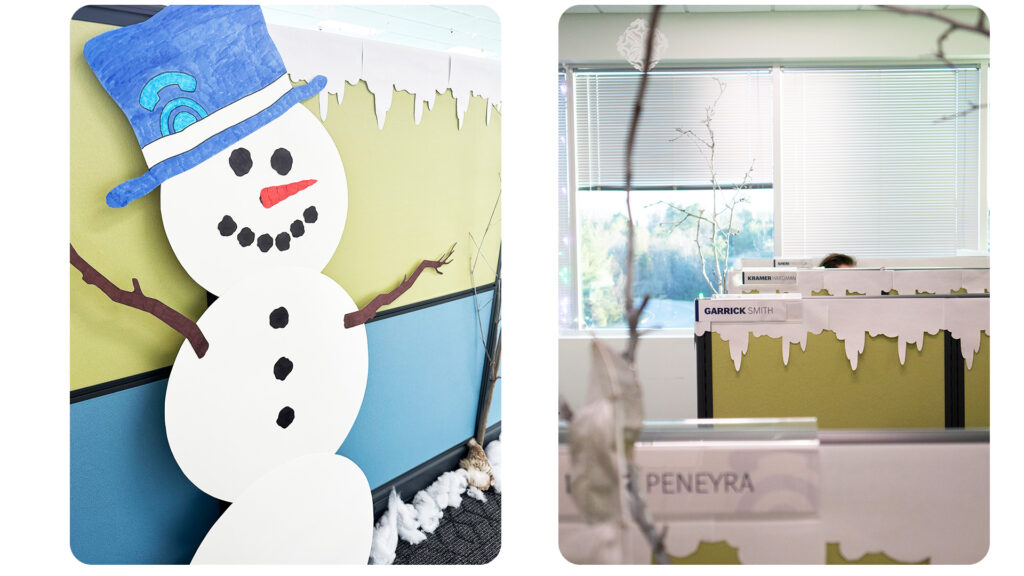Two photos: on the left, a handmade snowman cut from paper, with the CTM logo in the snowman's hat. On the right, cubicles are lined with papercut snow